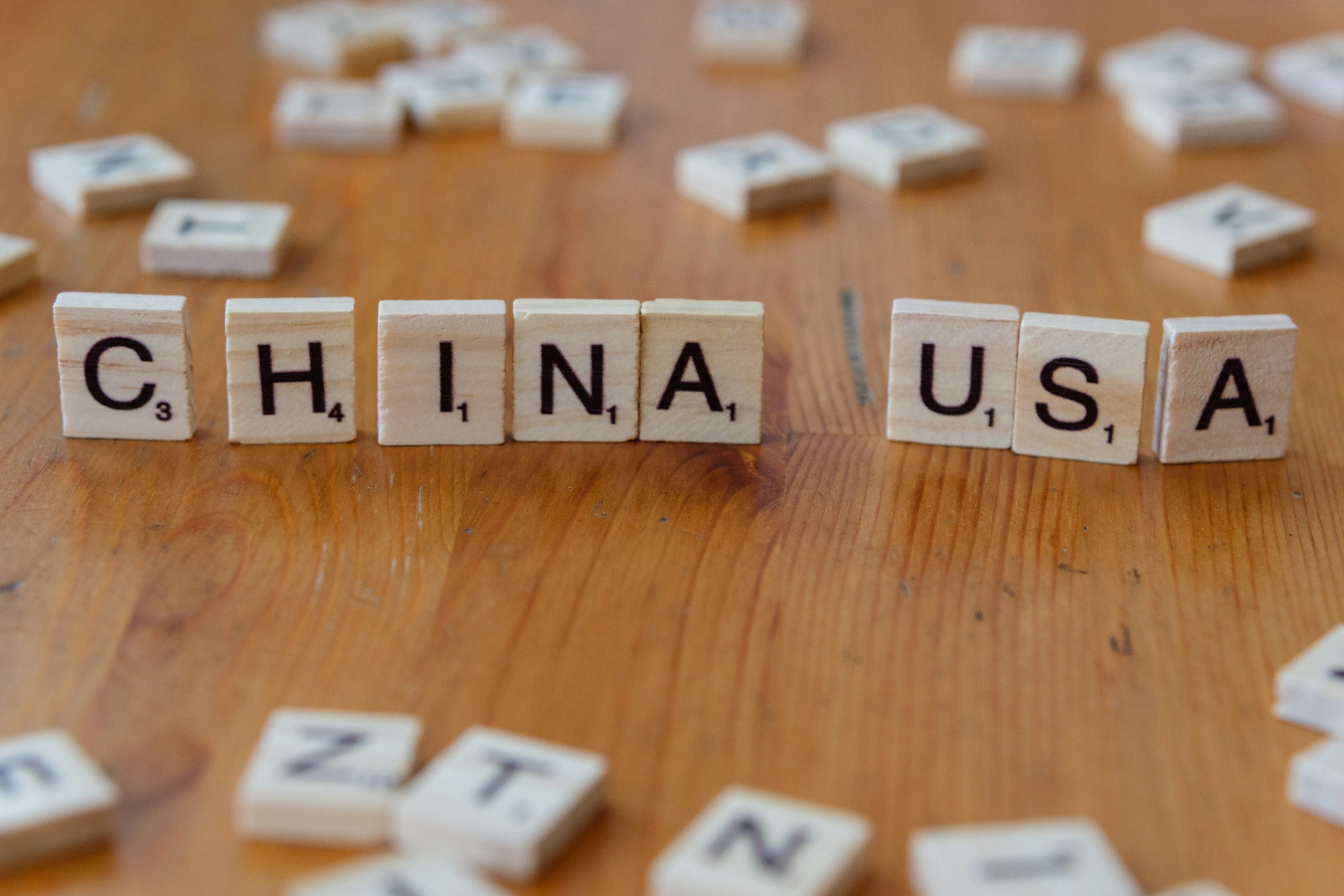 Students preparing for HSK Chinese proficiency exam with study materials and textbooks